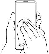 Image of wiping away moisture from the device with a micro-fiber cloth